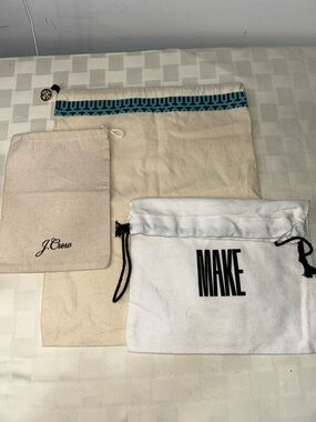 Tory Burch, J.Crew and Make dust bag bundle.